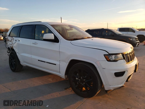 2022 Jeep Grand Cherokee Laredo X with VIN 1C4RJEAG4NC154150, listed as a Copart auction lot 42042685 with 64,155 mi miles and Salvage title. Bid and sale history available at DreamBid. Image 4.
