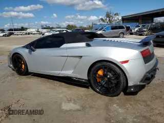 2013 Lamborghini Gallardo z VIN ZHWGU8AJ7DLA12671, wystawiony jako Copart lot #75721804 z przebiegiem 14 849 mil mil oraz Nie do naprawy. Historia ofert i sprzedaży dostępna na DreamBid. Obrazek 2.