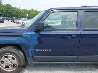 2016 Jeep Patriot Sport with VIN 1C4NJPBAXGD670093, listed as a IAAI auction lot 42429998 with 165,763 mi miles and . Bid and sale history available at DreamBid. Image 12.