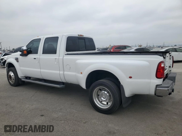 2010 Ford F-450 with VIN 1FTXW4CR9AEA96908, listed as a Copart auction lot 60075265 with 124,396 mi miles and Clean title. Bid and sale history available at DreamBid. Image 2.