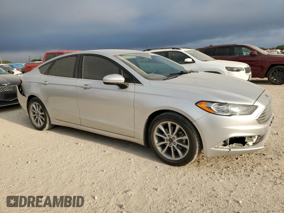 2017 Ford Fusion SE with VIN 3FA6P0HDXHR380057, listed as a Copart auction lot 52784005 with 115,038 mi miles and Salvage title. Bid and sale history available at DreamBid. Image 4.