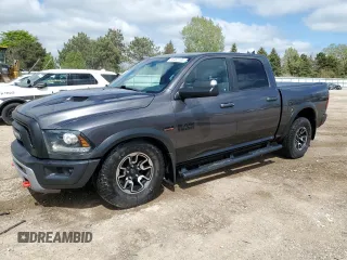 2018 Ram 1500 Rebel z VIN 1C6RR7YT4JS127688, wystawiony jako Copart lot #55455185 z przebiegiem 40 564 mil mil oraz Szkoda całkowita • Salvage title. Historia ofert i sprzedaży dostępna na DreamBid. Obrazek 1.