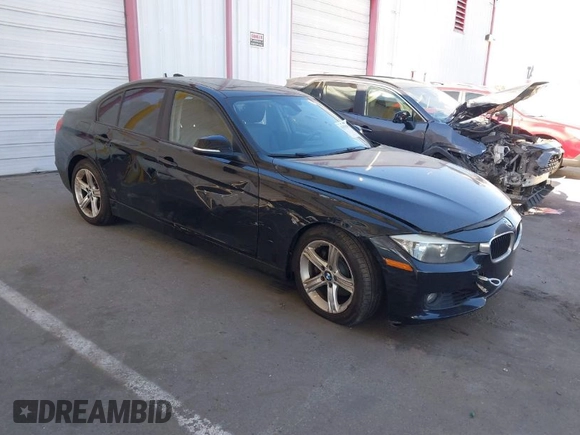 2013 BMW 3 Series 328i with VIN WBA3C1C54DF444998, listed as a IAAI auction lot 41392949 with 158,555 mi miles. Bid and sale history available at carsss.com. Image 1.