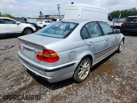 2004 BMW 3 Series 330xi with VIN WBAEW53464PG10935, listed as a Copart auction lot 63155905 with 165,240 mi miles and Clean title. Bid and sale history available at DreamBid. Image 3.