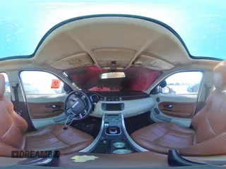2015 Land Rover Range Rover Evoque Prestige z VIN SALVV2BG2FH012781, wystawiony jako Copart lot #57328405 z przebiegiem Nie podano mil oraz Szkoda całkowita • Salvage title. Historia ofert i sprzedaży dostępna na DreamBid. Obrazek 14.