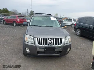 2009 Mercury Mariner with VIN 4M2CU91G49KJ05721, listed as a IAAI auction lot 41919006 with 105,537 mi miles. Bid and sale history available at carsss.com. Image 6.