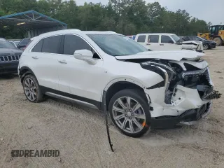 2023 Cadillac XT4 FWD Premium Luxury with VIN 1GYFZCR42PF193101, listed as a Copart auction lot 54977605 with 14,258 mi miles and Non repairable. Bid and sale history available at DreamBid. Image 4.