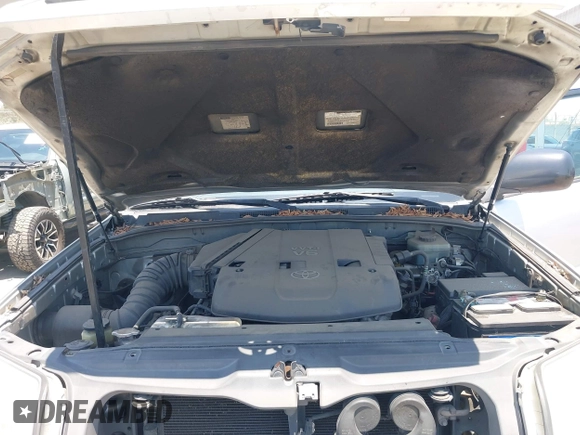 2003 Toyota 4Runner SR5 z VIN JTEZU14R830003562, wystawiony jako IAAI lot #42408101 z przebiegiem 269 316 mil mil oraz . Historia ofert i sprzedaży dostępna na DreamBid. Obrazek 10.