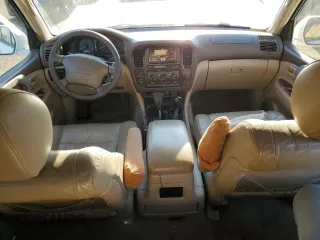 2000 Toyota Land Cruiser with VIN JT3HT05J5Y0105435, listed as a Copart auction lot 89409795 with 255,587 mi miles and Salvage Title. Bid and sale history available at carsss.com. Image 8.
