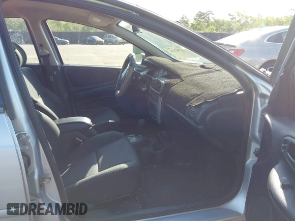 2005 Dodge Neon SXT with VIN 1B3ES56C75D266728, listed as a IAAI auction lot 41987334 with 138,901 mi miles. Bid and sale history available at carsss.com. Image 5.