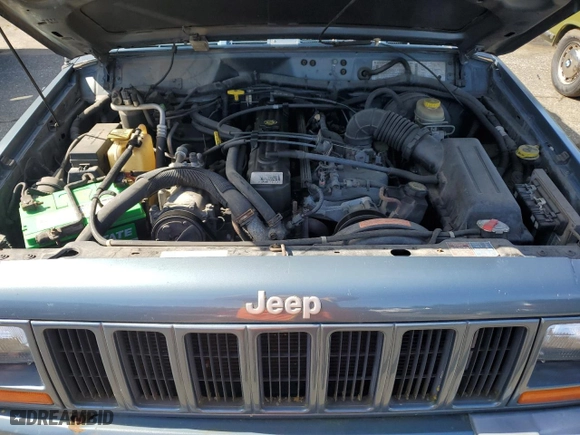 1999 Jeep Cherokee Sport with VIN 1J4FT68S3XL577599, listed as a Copart auction lot 50081715 with 182,974 mi miles and Clean Title. Bid and sale history available at carsss.com. Image 12.