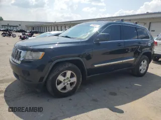 2011 Jeep Grand Cherokee Laredo z VIN 1J4RR4GG1BC554960, wystawiony jako Copart lot #59490405 z przebiegiem 218 694 mil mil oraz Czysty tytuł • Clean title. Historia ofert i sprzedaży dostępna na DreamBid. Obrazek 1.