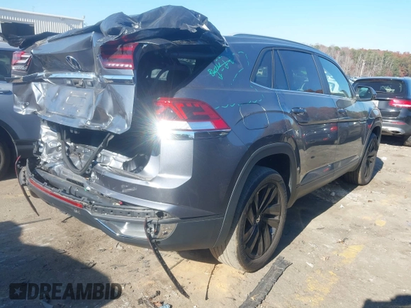2022 Volkswagen Atlas SE with VIN 1V2JE2CA6NC208457, listed as a IAAI auction lot 40999391 with 40,409 mi miles and . Bid and sale history available at DreamBid. Image 4.