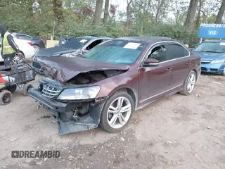 2014 Volkswagen Passat SEL Premium with VIN 1VWCS7A37EC022413, listed as a IAAI auction lot 40597042 with 131,866 mi miles. Bid and sale history available at carsss.com. Image 2.