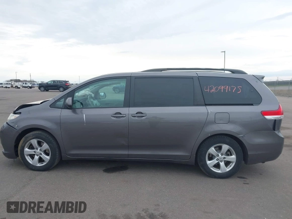 2011 Toyota Sienna LE AAS with VIN 5TDKK3DC3BS077857, listed as a IAAI auction lot 42099175 with 283,777 mi miles and . Bid and sale history available at DreamBid. Image 14.