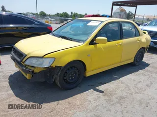 2002 Mitsubishi Lancer OZ-Rally z VIN JA3AJ86EX2U073129, wystawiony jako IAAI lot #42337379 z przebiegiem 257 556 mil mil oraz . Historia ofert i sprzedaży dostępna na DreamBid. Obrazek 18.