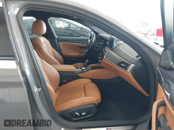 2021 BMW 5 Series 530e with VIN WBA13AG04MCF36168, listed as a IAAI auction lot 42256325 with 71,211 mi miles and . Bid and sale history available at DreamBid. Image 5.