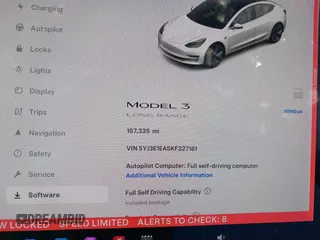 2019 Tesla Model 3 Mid Range with VIN 5YJ3E1EA5KF327181, listed as a IAAI auction lot 41860943 with 157,335 mi miles and . Bid and sale history available at DreamBid. Image 7.