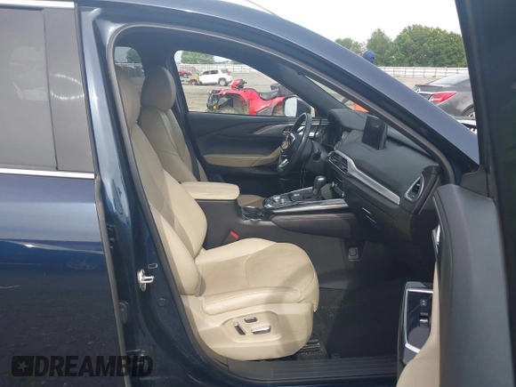 2020 Mazda CX-9 Grand Touring with VIN JM3TCBDY1L0402718, listed as a IAAI auction lot 42355511 with 87,205 mi miles and . Bid and sale history available at DreamBid. Image 5.