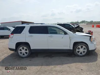 2016 GMC Terrain SLT z VIN 2GKFLPE37G6159617, wystawiony jako IAAI lot #42277132 z przebiegiem 128 987 mil mil oraz . Historia ofert i sprzedaży dostępna na DreamBid. Obrazek 13.