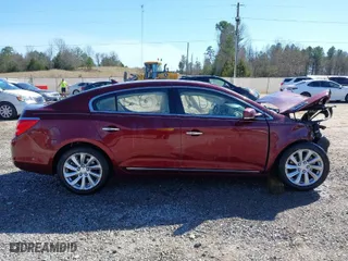 2014 Buick LaCrosse Leather with VIN 1G4GB5G37EF255881, listed as a IAAI auction lot 41674071 with 102,426 mi miles. Bid and sale history available at carsss.com. Image 13.