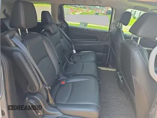 2023 Honda Odyssey EX-L z VIN 5FNRL6H67PB013527, wystawiony jako Copart lot #59705385 z przebiegiem 12 262 mil mil oraz Czysty tytuł • Clean title. Historia ofert i sprzedaży dostępna na DreamBid. Obrazek 6.