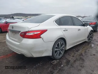 2016 Nissan Altima SR with VIN 1N4AL3AP7GC277879, listed as a IAAI auction lot 41523475 with 128,821 mi miles and . Bid and sale history available at carsss.com. Image 4.