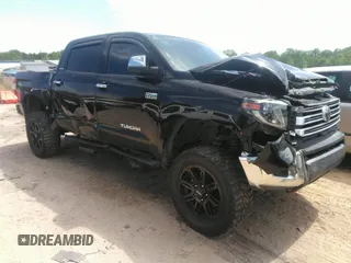 2020 Toyota Tundra Limited with VIN 5TFHY5F14LX935171, listed as a IAAI auction lot 42063553 with 99,847 mi miles and . Bid and sale history available at DreamBid. Image 1.