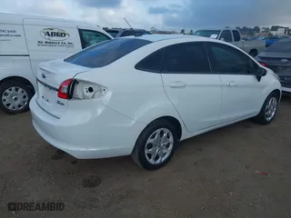 2013 Ford Fiesta S with VIN 3FADP4AJ7DM142687, listed as a IAAI auction lot 41911615 with 98,965 mi miles. Bid and sale history available at carsss.com. Image 4.