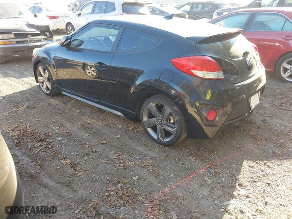 2013 Hyundai Veloster Turbo w/Black Int with VIN KMHTC6AE6DU140694, listed as a IAAI auction lot 40646014 with 74,500 mi miles. Bid and sale history available at carsss.com. Image 3.
