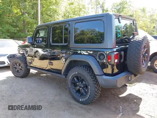 2021 Jeep Wrangler Unlimited Sport S with VIN 1C4HJXDNXMW646194, listed as a IAAI auction lot 42243169 with 44,237 mi miles and . Bid and sale history available at DreamBid. Image 3.
