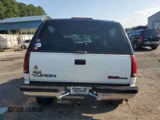 1995 GMC Yukon with VIN 1GKEK18K2SJ700616, listed as a Copart auction lot 68582034 with 205,980 mi miles and Salvage Title. Bid and sale history available at carsss.com. Image 6.