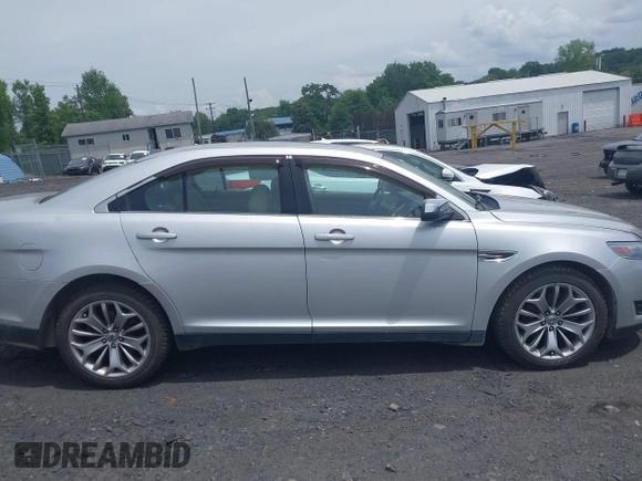 2014 Ford Taurus Limited with VIN 1FAHP2F82EG132673, listed as a IAAI auction lot 42669016 with 125,567 mi miles and . Bid and sale history available at DreamBid. Image 13.
