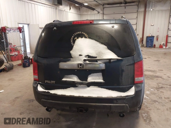 2009 Honda Pilot EX-L with VIN 5FNYF48579B044150, listed as a IAAI auction lot 41568792 with 244,763 mi miles. Bid and sale history available at carsss.com. Image 16.