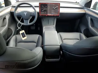 2024 Tesla Model Y Long Range z VIN 7SAYGDEE9RF186388, wystawiony jako Copart lot #58471595 z przebiegiem 23 185 mil mil oraz Szkoda całkowita • Salvage title. Historia ofert i sprzedaży dostępna na DreamBid. Obrazek 8.