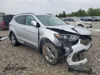 2017 Hyundai Santa Fe 2.4L z VIN 5XYZUDLB8HG500297, wystawiony jako Copart lot #58005165 z przebiegiem 91 871 mil mil oraz Szkoda całkowita • Salvage title. Historia ofert i sprzedaży dostępna na DreamBid. Obrazek 4.