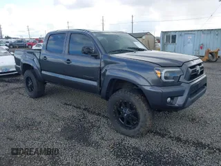 2013 Toyota Tacoma with VIN 3TMLU4ENXDM105967, listed as a IAAI auction lot 41819211 with 121,012 mi miles and . Bid and sale history available at carsss.com. Image 1.