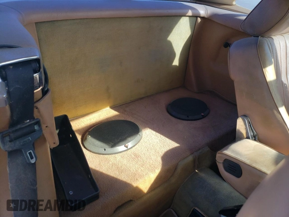 1986 Mercedes-Benz 560 SL z VIN WDBBA48D5GA042820, wystawiony jako Copart lot #71109364 z przebiegiem 173 240 mil mil oraz Czysty tytuł • Clean title. Historia ofert i sprzedaży dostępna na DreamBid. Obrazek 10.