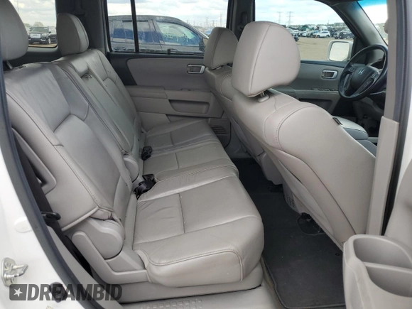 2013 Honda Pilot Touring z VIN 5FNYF4H91DB062722, wystawiony jako Copart lot #58308165 z przebiegiem 130 896 mil mil oraz Szkoda całkowita • Salvage title. Historia ofert i sprzedaży dostępna na DreamBid. Obrazek 11.