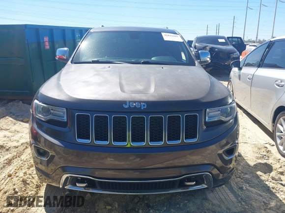 2014 Jeep Grand Cherokee Overland with VIN 1C4RJECG8EC409976, listed as a IAAI auction lot 41821685 with 186,105 mi miles. Bid and sale history available at carsss.com. Image 12.
