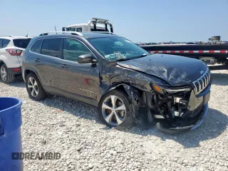 2019 Jeep Cherokee High Altitude with VIN 1C4PJMDX7KD260644, listed as a Copart auction lot 60416985 with 60,861 mi miles and Salvage title. Bid and sale history available at DreamBid. Image 4.