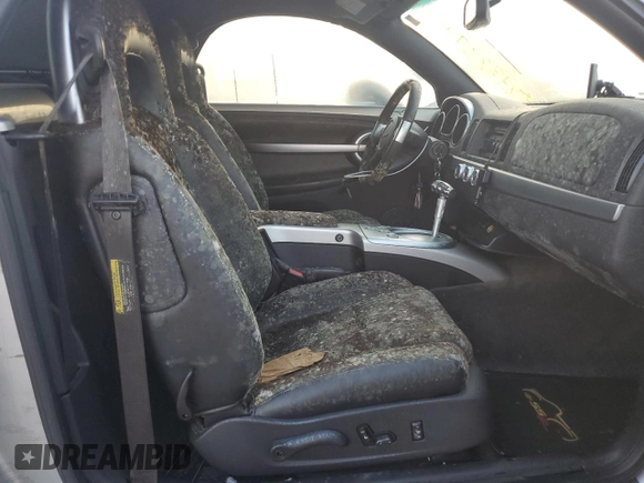 2004 Chevrolet SSR LS z VIN 1GCES14P14B105315, wystawiony jako Copart lot #74983944 z przebiegiem Nie podano mil oraz Szkoda całkowita • Salvage title. Historia ofert i sprzedaży dostępna na DreamBid. Obrazek 10.