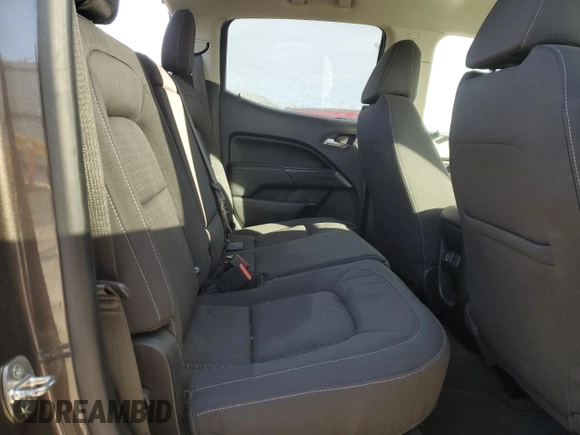 2019 GMC Canyon 4WD SLE with VIN 1GTG6CENXK1175565, listed as a Copart auction lot 82246854 with 39,949 mi miles and Salvage Title. Bid and sale history available at carsss.com. Image 10.
