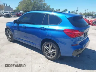 2017 BMW X1 sDrive28i with VIN WBXHU7C31H5H33281, listed as a IAAI auction lot 41814792 with 55,756 mi miles. Bid and sale history available at carsss.com. Image 3.