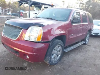 2007 GMC Yukon SLT with VIN 1GKFK13037J336725, listed as a IAAI auction lot 41434331 with 171,479 mi miles. Bid and sale history available at carsss.com. Image 2.