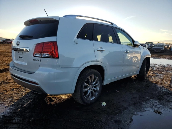 2012 Kia Sorento SX with VIN 5XYKWDA22CG243211, listed as a Copart auction lot 80150294 with 125,620 mi miles and Salvage Title. Bid and sale history available at carsss.com. Image 3.