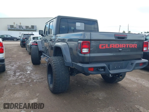 2023 Jeep Gladiator Sport S z VIN 1C6HJTAG9PL554845, wystawiony jako IAAI lot #41312360 z przebiegiem 18 077 mil mil oraz . Historia ofert i sprzedaży dostępna na DreamBid. Obrazek 3.