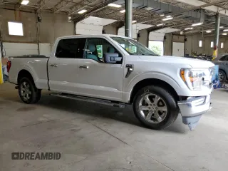 2021 Ford F-150 XL with VIN 1FTFW1E88MKE41611, listed as a Copart auction lot 61092115 with 83,277 mi miles and Salvage title. Bid and sale history available at DreamBid. Image 4.