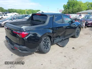 2022 Hyundai Santa Cruz SEL with VIN 5NTJBDAE2NH000464, listed as a IAAI auction lot 42329921 with 32,890 mi miles and . Bid and sale history available at DreamBid. Image 4.