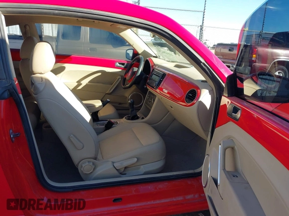 2013 Volkswagen Beetle with VIN 3VWHX7AT3DM682758, listed as a IAAI auction lot 40869170 with 88,793 mi miles and . Bid and sale history available at DreamBid. Image 5.